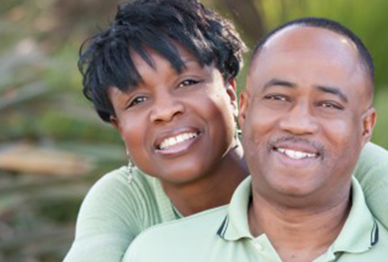 African American Man and Woman Smiling